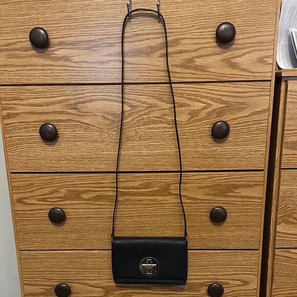 kate spade Handbags - Kate Spade Black Crossbody Bag with Silver Logo